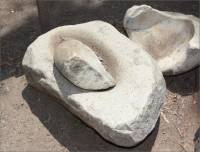 Broken stone mortar & pestle at the San Diego Mission, San Diego, CA