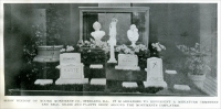 Show window of Moore Monument Co., Sterling, Ill. (Advertisement from Granite Marble and Bronze, Vol. XXXI No. 7, July 1921, pp. 44)