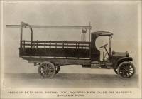 Truck of Bills Bros., Denver, Colo. equipped with crane for handling monument work.