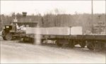 Fully-loaded flatcar parked near its future competitor – a late-1920s/early-1930s truck, Williamstown, VT