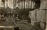 Marble Blocks in Yard along Railroad Tracks (early postcard photograph, possibly in Alaska)