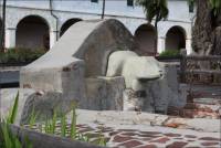 Closeup of north end of the Santa Barbara Mission lavanderia and bear figure (CA)