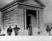 Five workers standing in front of Isaac Minor's mausoleum (Humboldt State University Library, Special Collections)